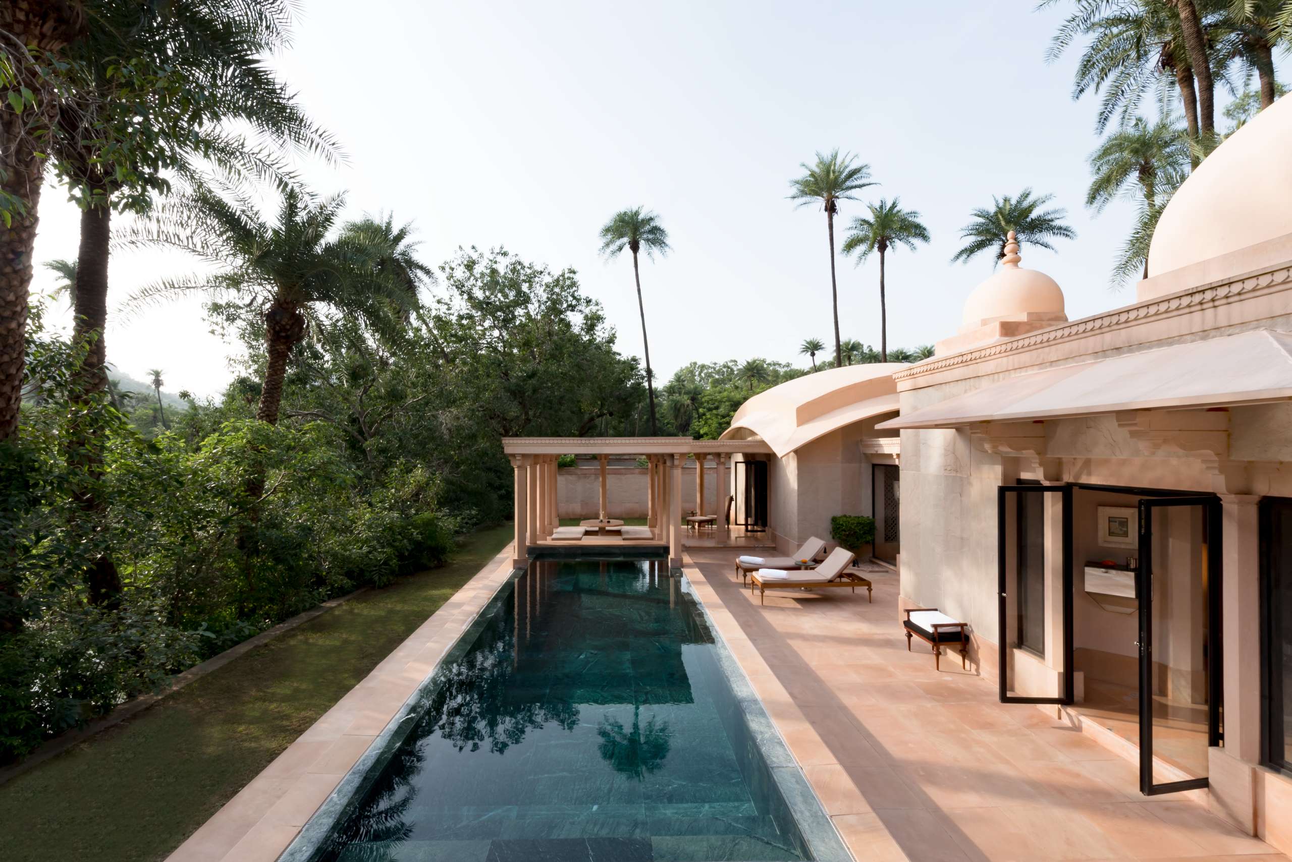 Discover Amanbagh in Rajasthan, a serene luxury resort in the Aravalli Hills with Mughal-inspired suites, spa wellness, gardens, and cultural experiences.
