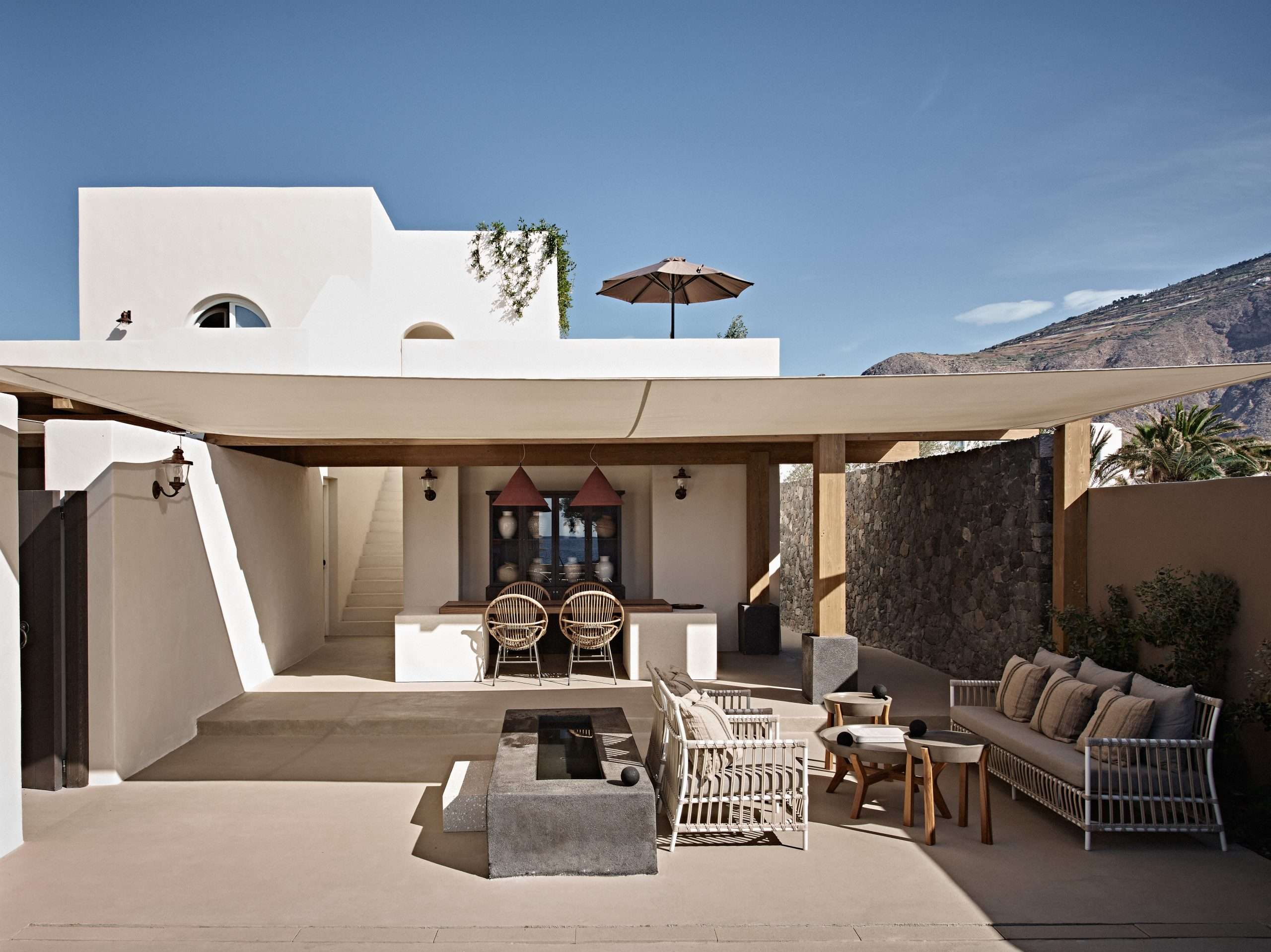 Discover Istoria Santorini, a boutique beachfront hotel on Perivolos Beach with private terrace suites, spa treatments, fine dining, and serene island luxury.