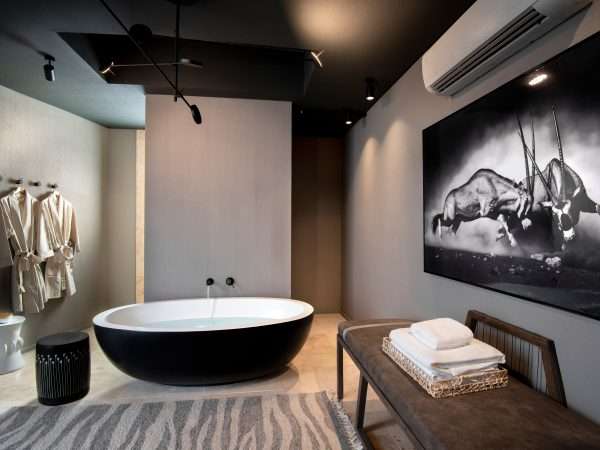Sossusvlei-Desert-Lodge-General-Guest-Area-Spa-bathroom-with-robes-Collections-5000w