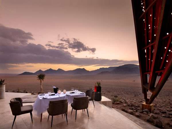 Sossusvlei-Desert-Lodge-general-guest-area-dinner-on-the-patio-1-Collections-5000w