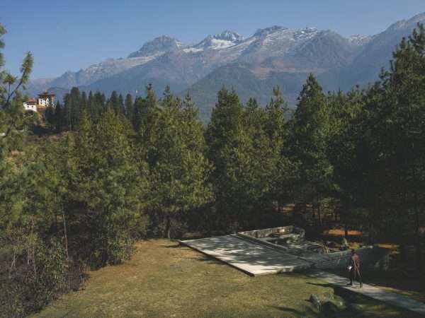 Amankora, Bhutan . Accommodation, Paro lodge, Firepit terrace with Drukgyel Dzong view
