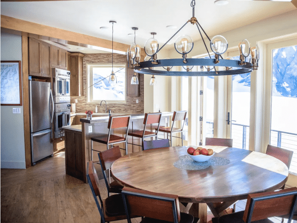 66697614224f6cdeec0cb3e8_Sheldon Chalet kitchen and dining-min