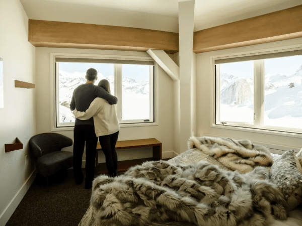666c47a5b6d59b78ad10ee8a_Guests enjoying the view from the chalet-min